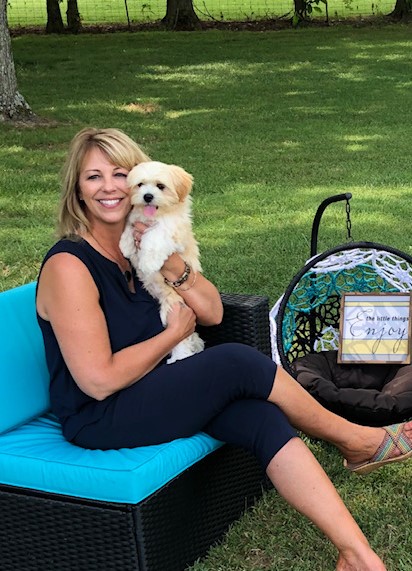 Image is of Kris of Family Teddy Bears with a LhasaPoo. 
